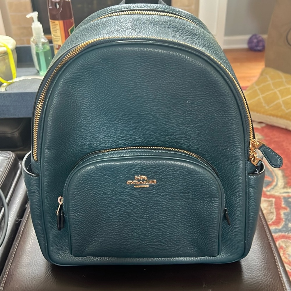 Coach Backpack.  Dark teal pebbled leather with brass hardware.